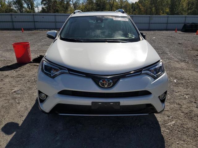 Photo 5 from auction – 2018 TOYOTA RAV4 LIMIT with VIN JTMDFREV3JJ248960