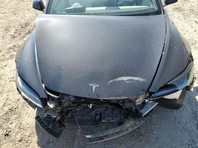 Photo 11 from auction – 2025 TESLA MODEL 3 with VIN 5YJ3E1EAXSF004647