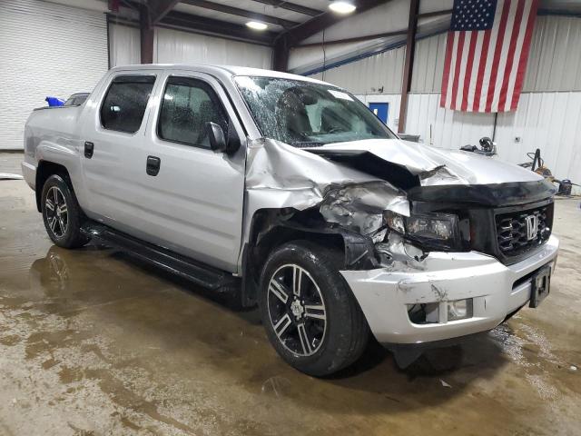 Photo 4 from auction – 2014 HONDA RIDGELINE with VIN 5FPYK1F70EB002497