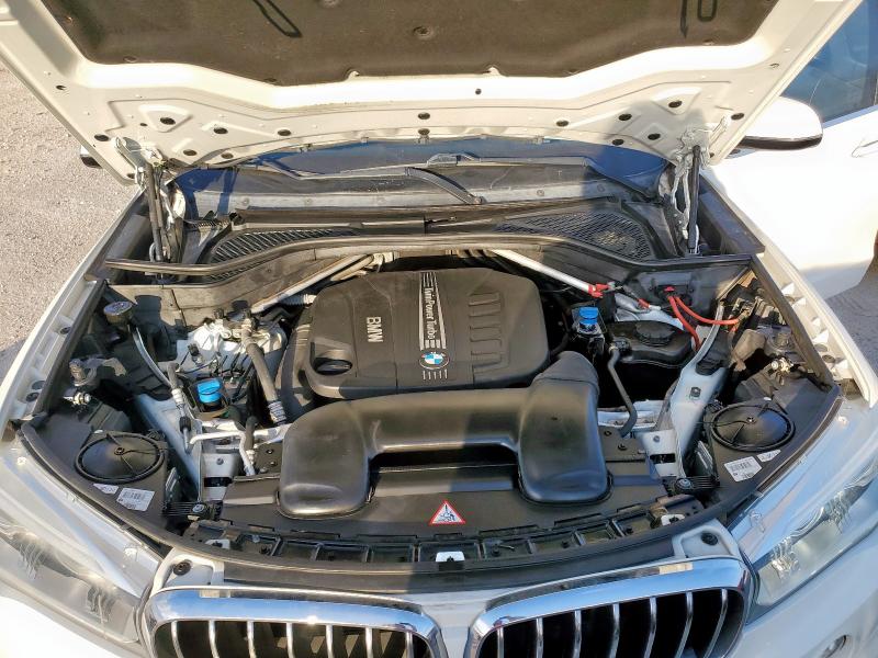 Photo 12 from auction – 2014 BMW X5 XDRIVE3 with VIN 5UXKS4C59E0J94101