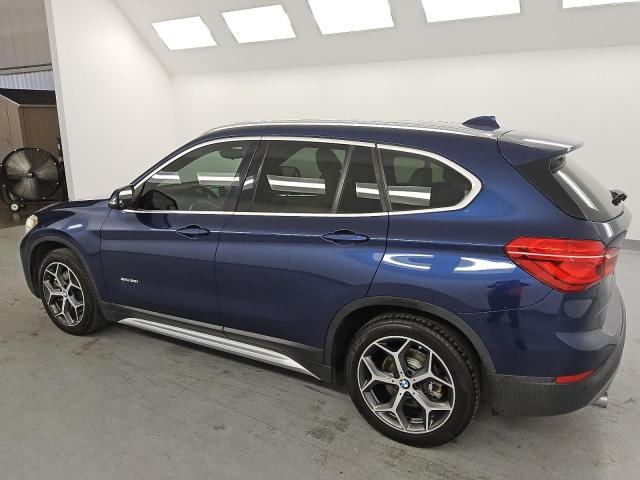 Photo 2 from auction – 2017 BMW X1 XDRIVE2 with VIN WBXHT3C34H5F81962