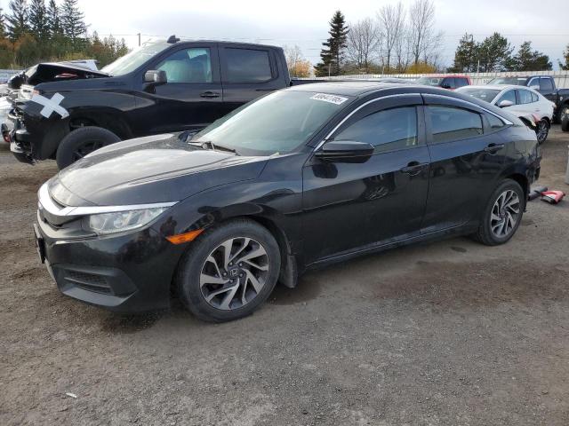 HONDA CIVIC EX 2016 with VIN 2HGFC2F70GH002971 - Photo from auction