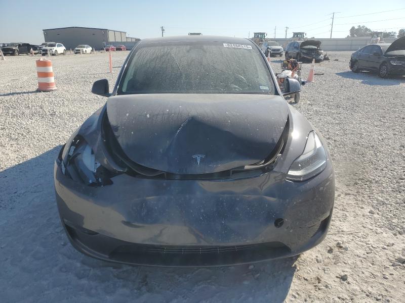 Photo 5 from auction – 2023 TESLA MODEL Y with VIN 7SAYGDED9PF947604