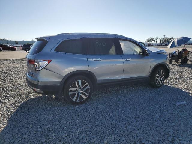 Photo 3 from auction – 2018 HONDA PILOT TOUR with VIN 5FNYF5H93JB011143