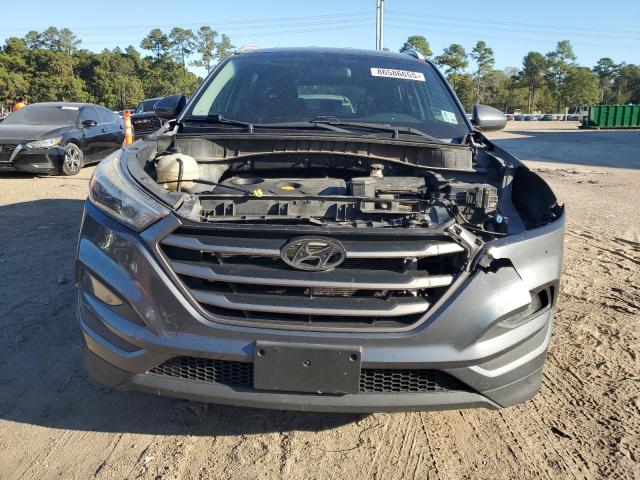 Photo 5 from auction – 2016 HYUNDAI TUCSON LIM with VIN KM8J33A48GU074294