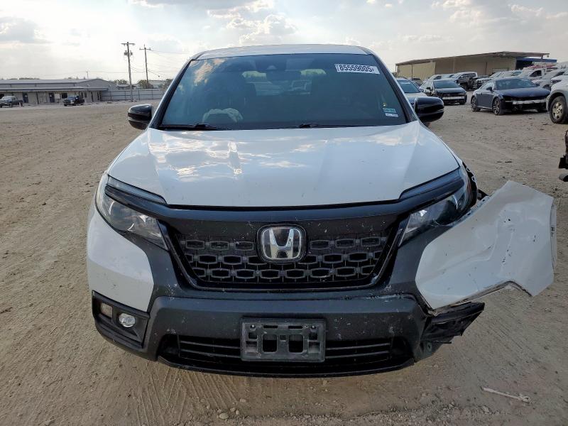 Photo 5 from auction – 2020 HONDA PASSPORT E with VIN 5FNYF7H50LB004226