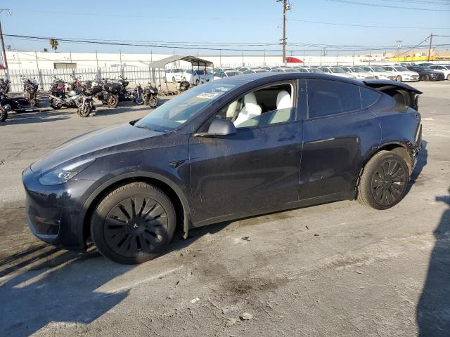 TESLA MODEL Y 2024 with VIN 7SAYGDEE5RA265246 - Photo from auction