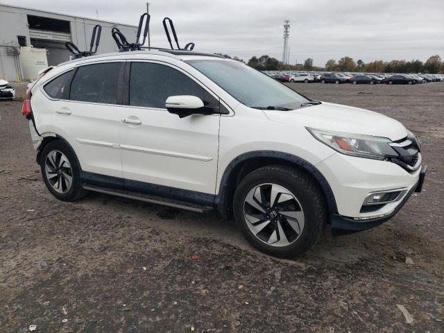 Photo 4 from auction – 2016 HONDA CR-V with VIN 5J6RM4H93GL025094