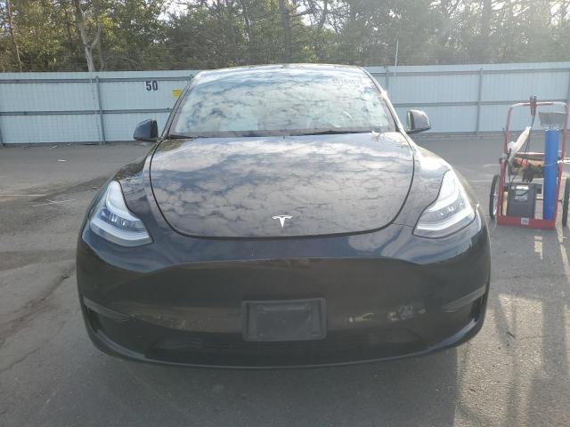 Photo 5 from auction – 2022 TESLA MODEL Y with VIN 7SAYGDEE1NF339632