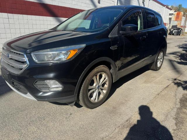 Photo 2 from auction – 2017 FORD ESCAPE SE with VIN 1FMCU9GD1HUE81634