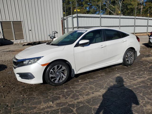 HONDA CIVIC EX 2017 with VIN 19XFC2F79HE075543 - Photo from auction