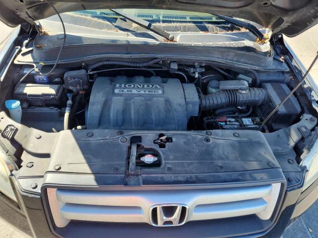 Photo 12 from auction – 2006 HONDA PILOT EX with VIN 2HKYF18526H537312