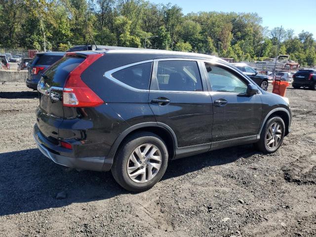 Photo 3 from auction – 2015 HONDA CR-V with VIN 2HKRM4H73FH620678