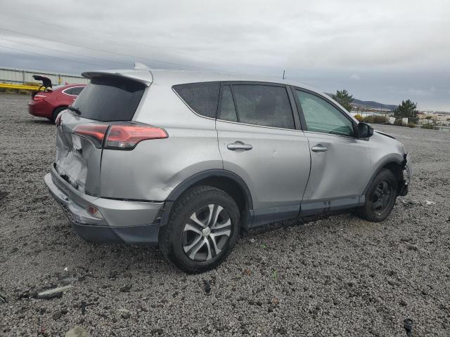 Photo 3 from auction – 2018 TOYOTA RAV4 LE with VIN 2T3BFREV6JW739368