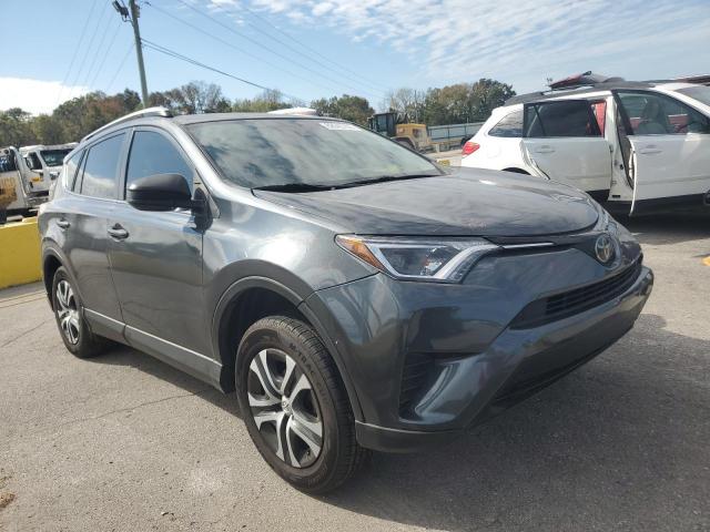 Photo 4 from auction – 2018 TOYOTA RAV4 LE with VIN JTMZFREV2JJ196811