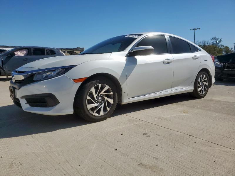 HONDA CIVIC EX 2018 with VIN 19XFC2F71JE014080 - Photo from auction