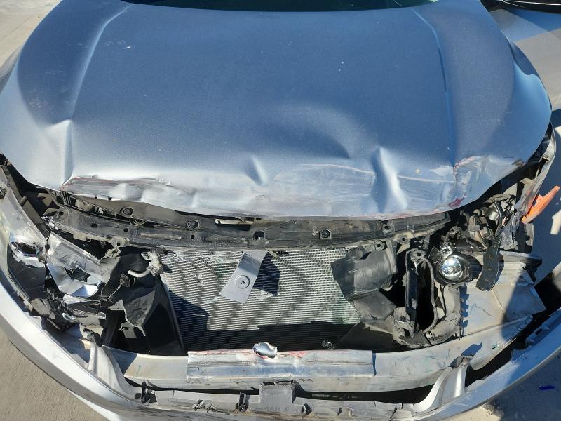 Photo 11 from auction – 2018 HONDA CIVIC with VIN 19XFC2F73JE034105