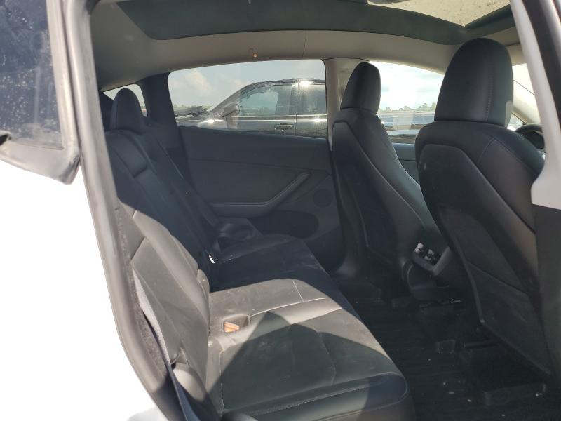 Photo 11 from auction – 2023 TESLA MODEL Y with VIN 7SAYGDEE3PA211683