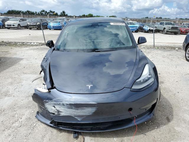 Photo 5 from auction – 2021 TESLA MODEL 3 with VIN 5YJ3E1EA8MF851024