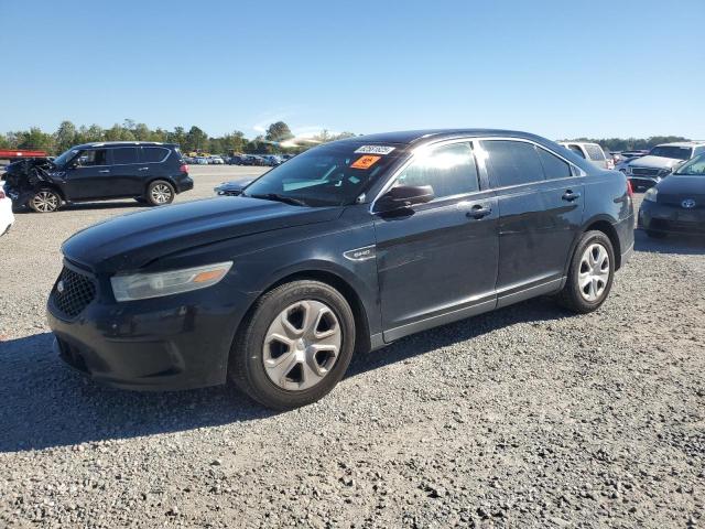 FORD TAURUS POL 2014 with VIN 1FAHP2MK0EG124487 - Photo from auction