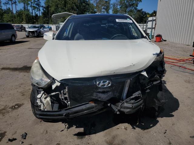 Photo 5 from auction – 2012 HYUNDAI TUCSON GLS with VIN KM8JUCAC0CU381652