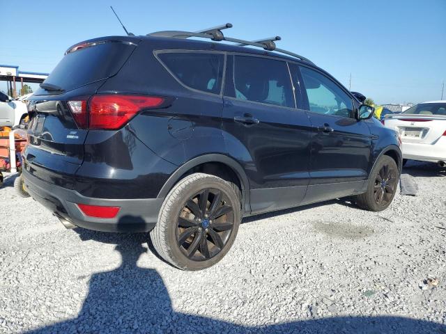 Photo 3 from auction – 2019 FORD ESCAPE SE with VIN 1FMCU9GD4KUB09857