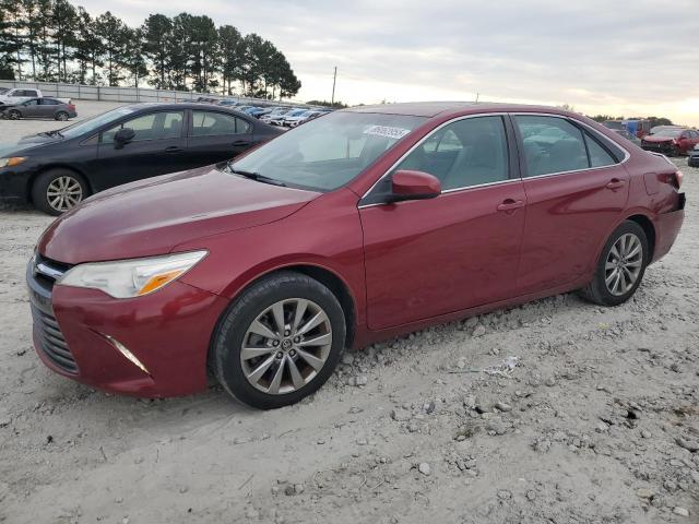 TOYOTA CAMRY LE 2017 with VIN 4T1BF1FK1HU701359 - Photo from auction