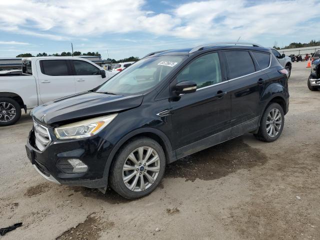 FORD ESCAPE TITANIUM 2017 with VIN 1FMCU0JD0HUE52386 - Photo from auction