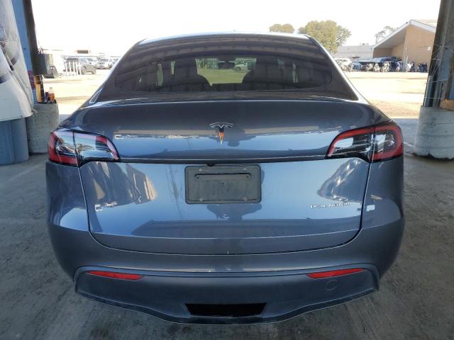 Photo 6 from auction – 2023 TESLA MODEL Y with VIN 7SAYGDEE2PF928837