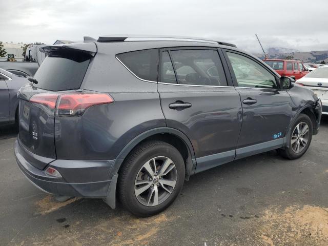Photo 3 from auction – 2017 TOYOTA RAV4 XLE with VIN JTMRFREV9HJ108654