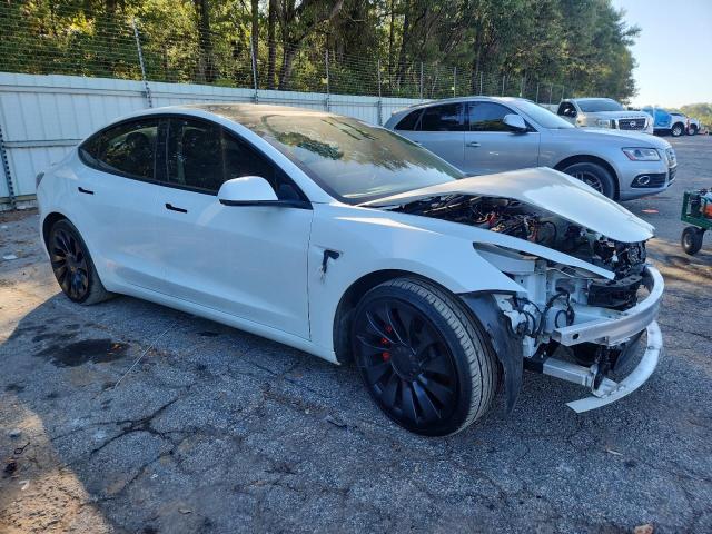 Photo 4 from auction – 2022 TESLA MODEL 3 with VIN 5YJ3E1EC7NF230408