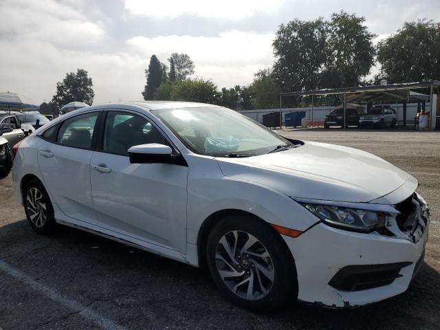 Photo 4 from auction – 2018 HONDA CIVIC EX with VIN 19XFC2F77JE207107