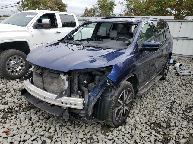 HONDA PILOT TOUR 2022 with VIN 5FNYF6H67NB002074 - Photo from auction