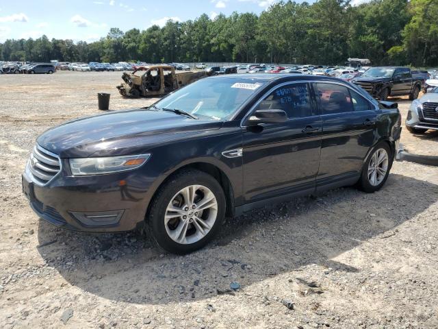 FORD TAURUS SEL 2014 with VIN 1FAHP2E84EG112832 - Photo from auction