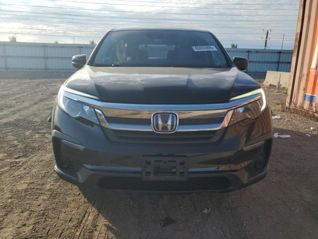 Photo 5 from auction – 2019 HONDA PILOT LX with VIN 5FNYF6H12KB051182