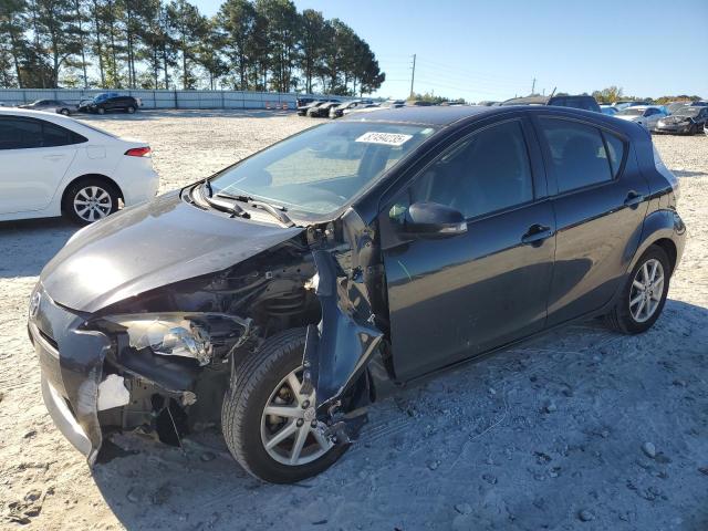 TOYOTA PRIUS C 2012 with VIN JTDKDTB30C1004912 - Photo from auction