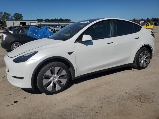 TESLA MODEL Y 2023 with VIN 7SAYGAEE7PF877589 - Photo from auction