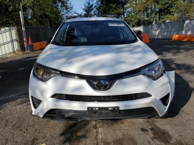 Photo 5 from auction – 2018 TOYOTA RAV4 LE with VIN 2T3BFREV9JW724928