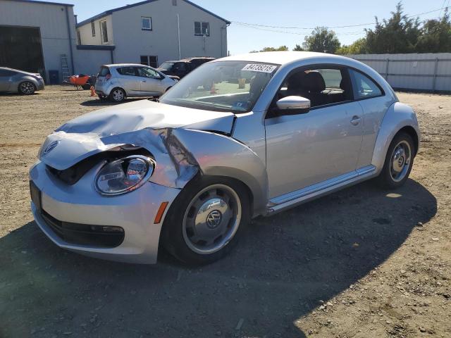 VOLKSWAGEN BEETLE 2012 with VIN 3VWHP7AT2CM627572 - Photo from auction