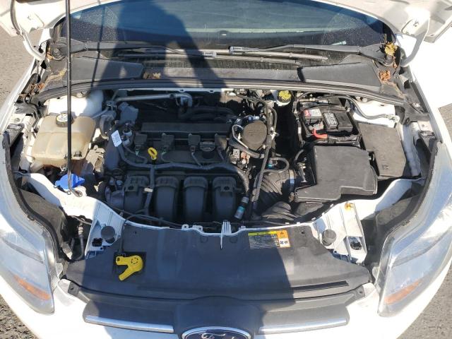 Photo 11 from auction – 2012 FORD FOCUS S with VIN 1FAHP3E24CL461138