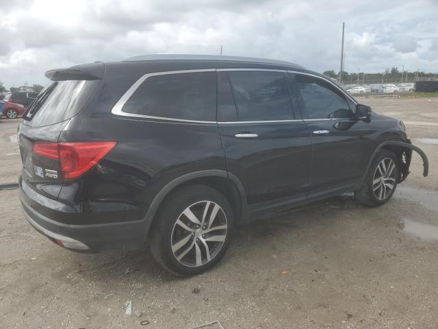 Photo 3 from auction – 2017 HONDA PILOT TOURING with VIN 5FNYF6H96HB092090