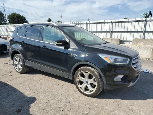 Photo 4 from auction – 2018 FORD ESCAPE TIT with VIN 1FMCU9J95JUD09939