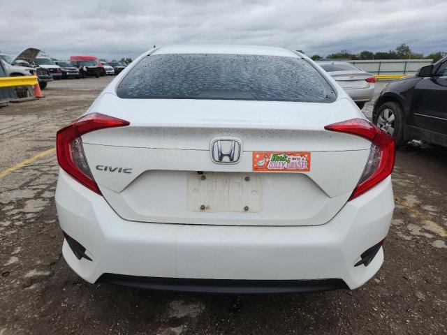 Photo 6 from auction – 2018 HONDA CIVIC LX with VIN 2HGFC2F55JH568520