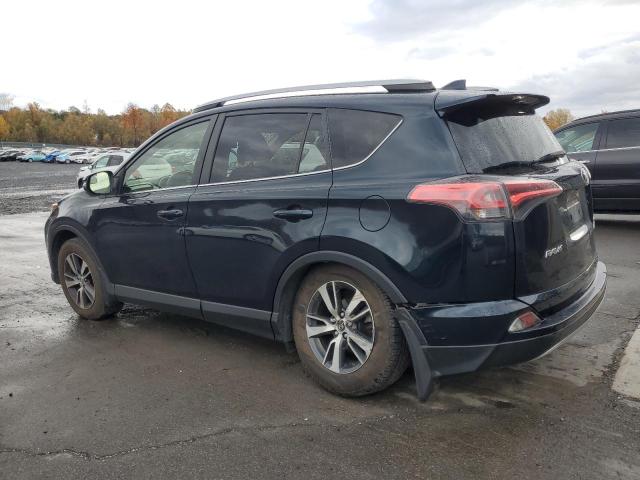 Photo 2 from auction – 2017 TOYOTA RAV4 XLE with VIN JTMRFREV9HJ706565