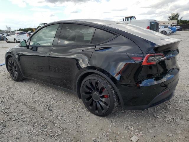 Photo 2 from auction – 2021 TESLA MODEL Y with VIN 5YJYGDEF3MF099004