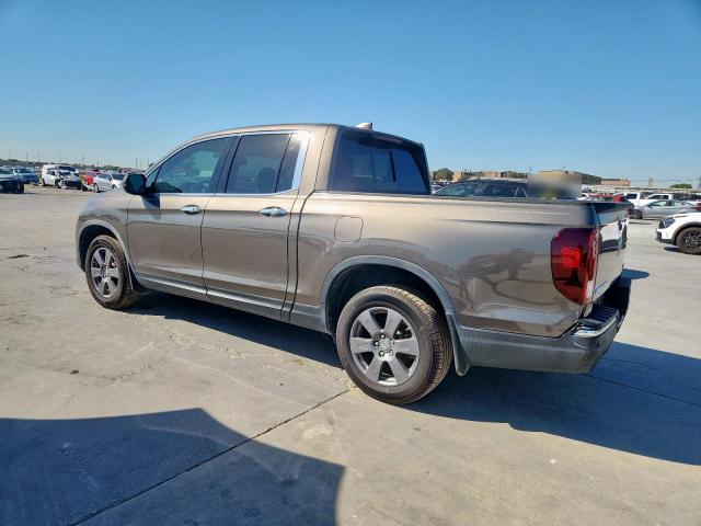 Photo 2 from auction – 2020 HONDA RIDGELINE with VIN 5FPYK3F72LB011694