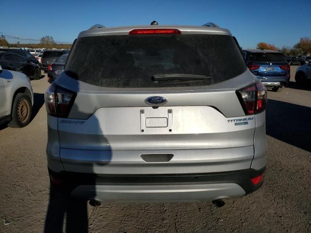 Photo 6 from auction – 2017 FORD ESCAPE TITANIUM with VIN 1FMCU9J92HUE99127