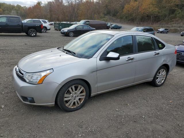 FORD FOCUS SEL 2011 with VIN 1FAHP3HNXBW128512 - Photo from auction