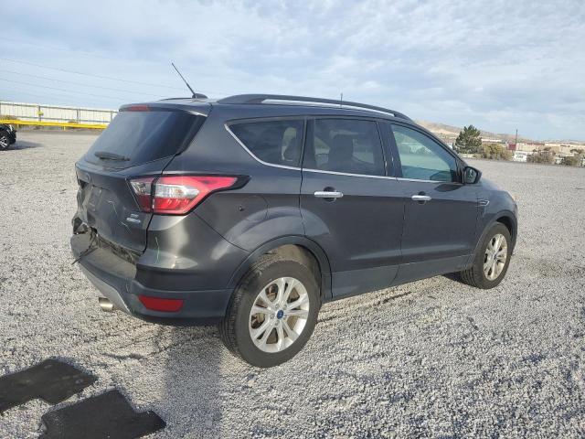 Photo 3 from auction – 2018 FORD ESCAPE SE with VIN 1FMCU9GDXJUA32071