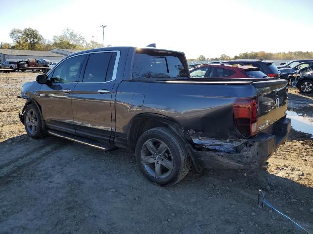 Photo 2 from auction – 2023 HONDA RIDGELINE with VIN 5FPYK3F71PB056230